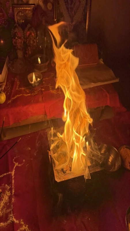 Traditional Hindu पूजा ceremony with spiritual offerings